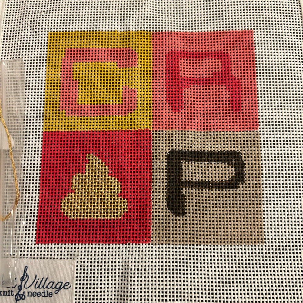 Needlepoint Canvas with thread